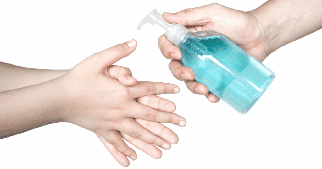 Person applying hand sanitizer correctly to both hands